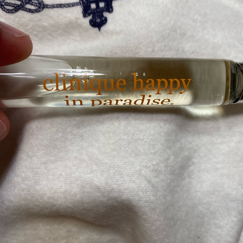 Clinique Happy in Paradise Roller with Orange Text